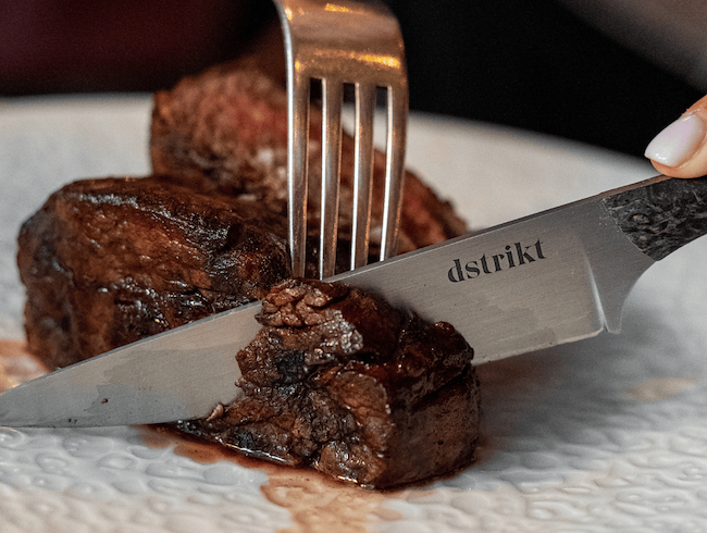 Executive Chef standing in restaurant
